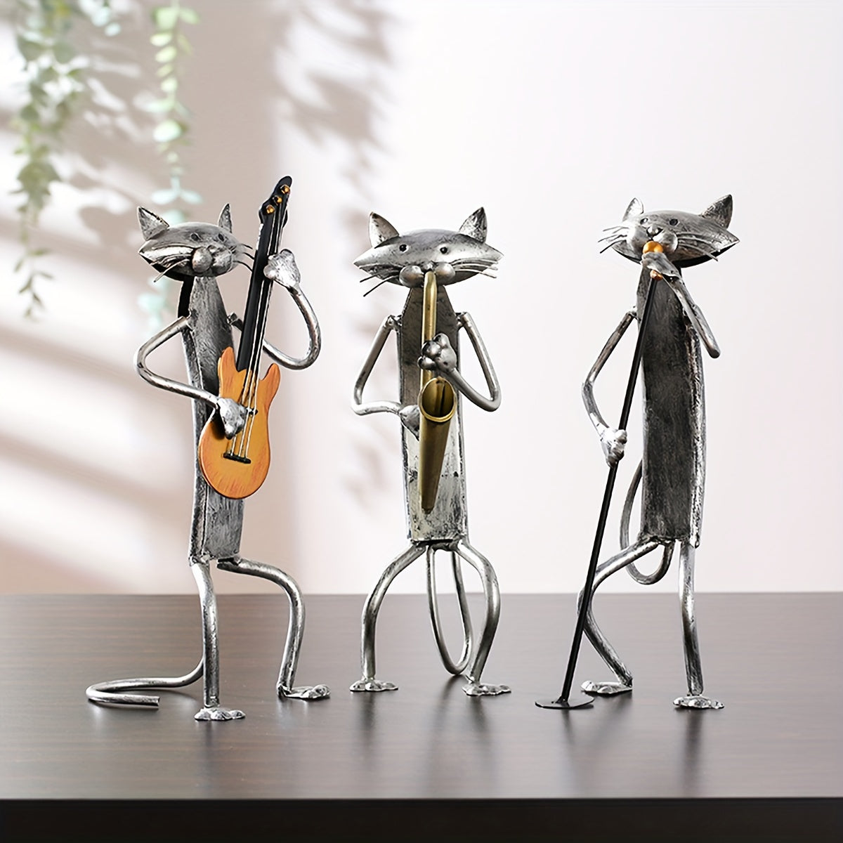 Iron Sculpture of a Cat Band Featuring a Saxophone, Guitar, And Microphone, Designed As Decorative Ornaments for Cat Lovers. A Handmade Metal Piece Perfect for Home Decor, Ideal As a Holiday Or Christmas Gift for Music Enthusiasts